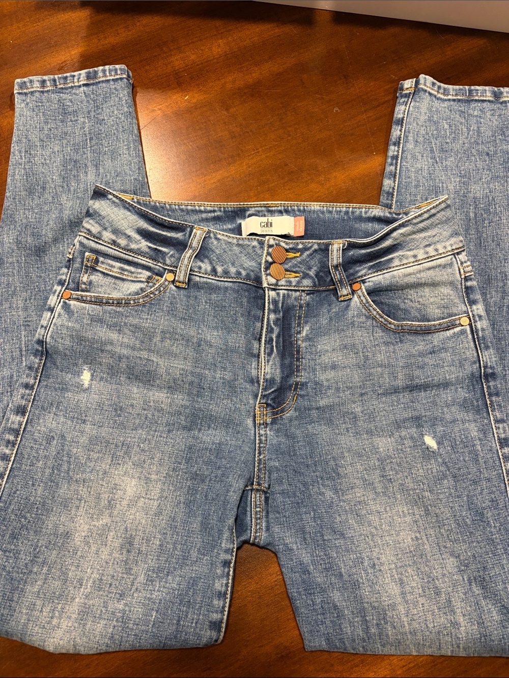 CAbi Cinch Skinny Medium Wash Skinny Jeans with Subtle Distress